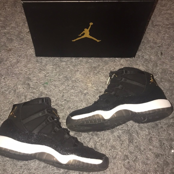 black and gold 11s jordans